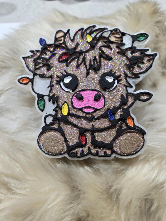 Cow with Christmas lights