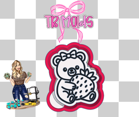 Bear holding strawberry