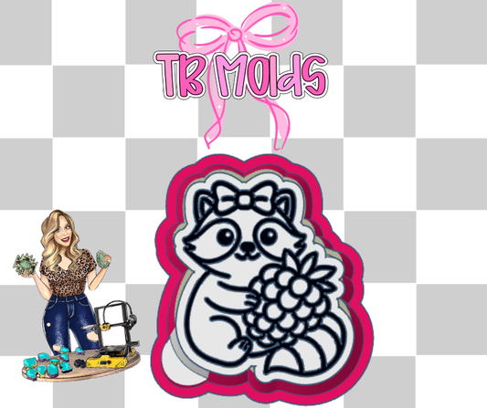 Raccoon holding raspberry