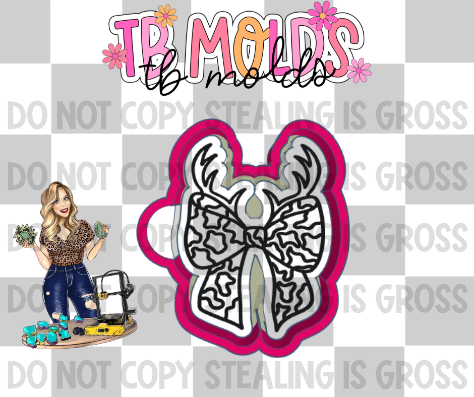 Camo bow with antlers