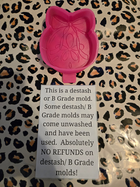 DESTASH sand dollar with bow